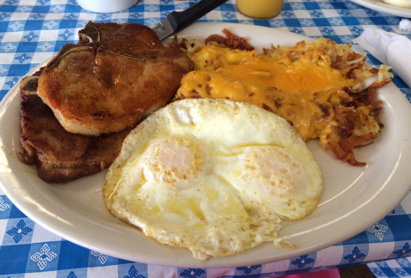 porkchop, eggs and hash brown platter